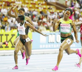 Shelly Ann Fraser-Pryce sprints to victory in the women’s 100m at the IAAF World Championships yesterday. (Reuters photo) 