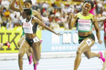 Shelly Ann Fraser-Pryce sprints to victory in the women’s 100m at the IAAF World Championships yesterday. (Reuters photo)