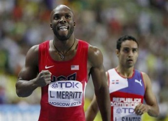 LaShawn Merritt (L) of the U.S. reacts next to third placed Luguelin Santos of Dominican Republic after winning the men’s 400 metres final of the IAAF World Athletics Championships at the Luzhniki Stadium in Moscow, August 13, 2013. Credit: Reuters/Lucy Nicholson 