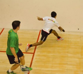 Guyana’s Sunil Seth plays a backhand shot during his men’s singles final clash against defending champion Chris Binnie. (Photo courtesy of Troy Parboo)  