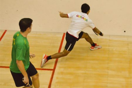 Guyana’s Sunil Seth plays a backhand shot during his men’s singles final clash against defending champion Chris Binnie. (Photo courtesy of Troy Parboo) 

