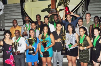 Overall 2013 Senior Caribbean Squash Championships Team Champions Guyana with the spoils. (Orlando Charles photo) 