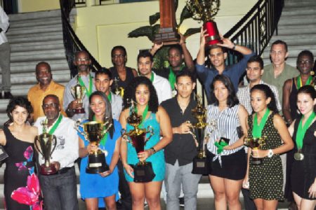 Overall 2013 Senior Caribbean Squash Championships Team Champions Guyana with the spoils. (Orlando Charles photo)
