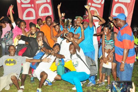 NEW CHAMPIONS! Running Brave Athletics Club celebrates after winning the Boyce/Jefford Classic IV last Sunday evening in Linden. (Photo by Orlando Charles)