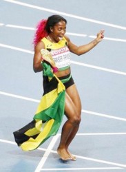 Shelly-Ann Fraser-Pryce of Jamaica celebrates winning the women’s 100 metres final during the IAAF World Athletics Championships at the Luzhniki Stadium in Moscow earlier this month. REUTERS/Maxim Shemetov
