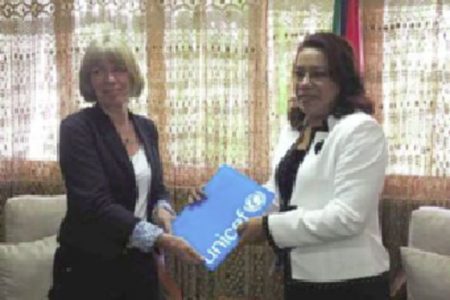 UNICEF’s Representative for Guyana and Suriname,  Marianne Flach (left) presents her credentials to Foreign Affairs Minister Carolyn Rodrigues-Birkett. (GINA photo)
