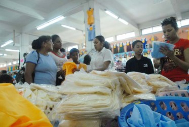 Mothers picking up school uniforms at Guyana Stores this week