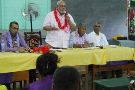 President Donald Ramotar speaking to the gathering. At left is Minister of Natural Resources, Robert Persaud and to the president’s immediate right is Chairman of Region Five, Bindrabhan Bisnauth