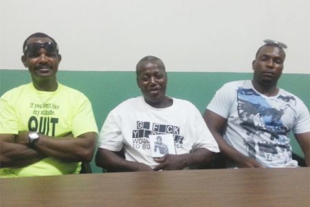 Carl Goulding, left, Terrence Alli, centre and Omatolalong Goulding at the press conference on Thursday.
