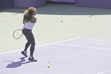 Reigning U.S. Open champion Serena Williams participates in a skills competition during Arthur Ashe Kids’ Day at the USTA Billie Jean King National Tennis Center in New York yesterday. Credit: Reuters/Eric Thayer