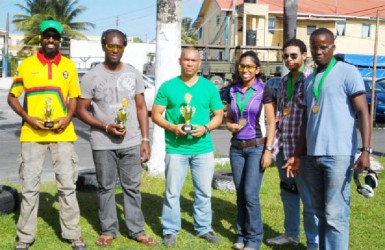 Winner Dale Hing (Centre)  with other prize winners following last Saturday’s shoot at the TSU ranges. 