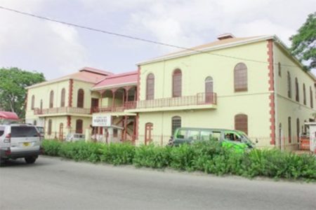 The Georgetown Magistrates’ Court complex at the corners of Brickdam and Avenue of the Republic has been undergoing repairs for two years. (Stabroek News file photo)