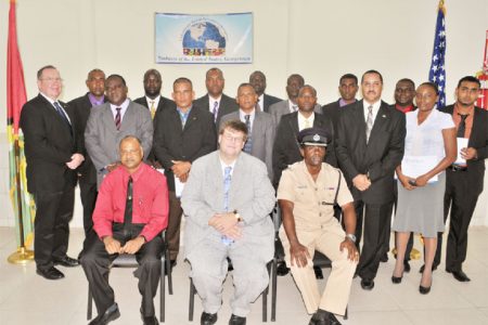 The participants in the International Passenger Identification Training Programme with (seated from left) Crime Chief Seelall Persaud, US Embassy Charge d’Affaires Bryan Hunt and Force Training Officer Paul Williams. (Photo courtesy of US Embassy Georgetown)