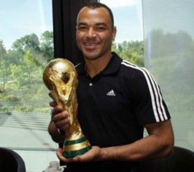 Brazilian football legend Cafu holds the FIFA World Cup Trophy during a visit to FIFA in Zurich last year. (FIFA photo)