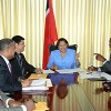 Prime Minister Kamla Persad- Bissessar, centre, speaks with Opposition Leader Dr Keith Rowley, right, during a discussion on crime at the Diplomatic Centre, St Ann’s, yesterday. Looking on, from left, are Clifton De Coteau, Minister of National Diversity and Social Integration; Attorney General Anand Ramlogan; and Legal Affairs Minister Prakash Ramadhar.