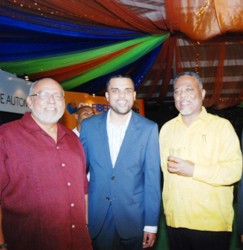 President Donald Ramotar (left) shares a moment with the Managing Director of E-Networks, Vishok Persaud (centre) and Prime Minister Samuel Hinds. (GINA photo)