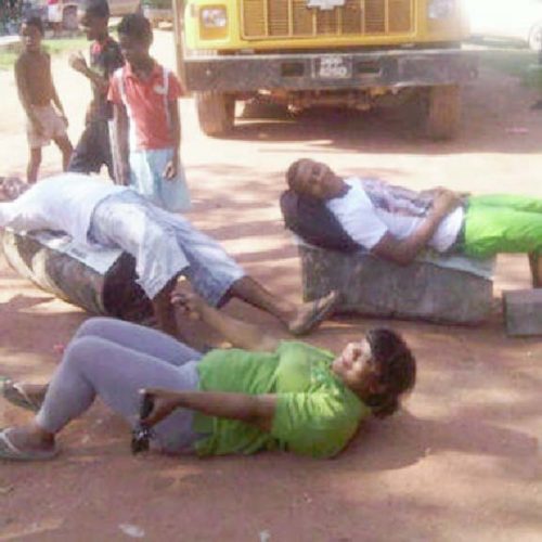 These protestors were lying across the road in Kwakwani yesterday.
