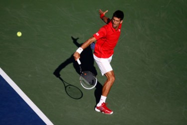 Top seed Novak Djokovic plays a backhand during his match with Marcel Granollers yesterday. 