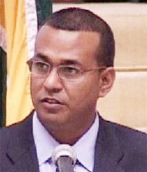 Natural Resources and Environment Minister  Robert Persaud 