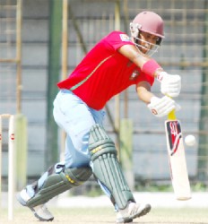 Robin Bacchus drives in his innings of 85