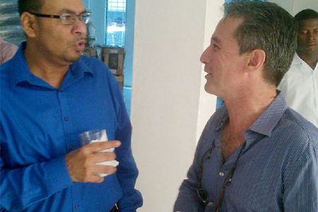 Natural Resources Minister Robert Persaud (left) and HFD investor Jarel Dawson during yesterday’s opening ceremony