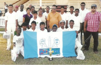 The winning U15 team posing with NCN members and members of the Berbice Cricket Board.