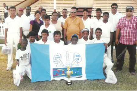 The winning U15 team posing with NCN members and members of the Berbice Cricket Board.