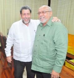 President Donald Ramotar (right) with St Vincent Prime Minister Ralph Gonsalves at the Office of the President on Monday. (GINA photo) 