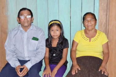 Beneficiaries, Verly Fredricks and her husband Rileigh Fredricks, and their daughter in their new home (GINA photo)  