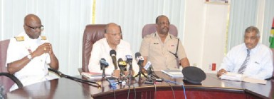 Minister of Home Affairs, Clement Rohee (second from left), Guyana Defence Force Chief of Staff Gary Best (left), Commissioner of Police, Leroy Brummel (second from right) and Commissioner General, Guyana Revenue Authority, Khurshid Sattaur updating the media on their meetings. (GINA photo)  