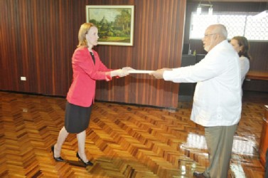 New Canadian High Commissioner to Guyana, Dr. Nicole Giles presenting her Letters of Credence to President Donald Ramotar at the Office of the President yesterday. Dr Giles is the first female Canadian High Commissioner to Guyana. (GINA photo)