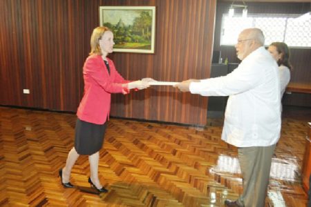 New Canadian High Commissioner to Guyana, Dr. Nicole Giles presenting her Letters of Credence to President Donald Ramotar at the Office of the President yesterday. Dr Giles is the first female Canadian High Commissioner to Guyana. (GINA photo)