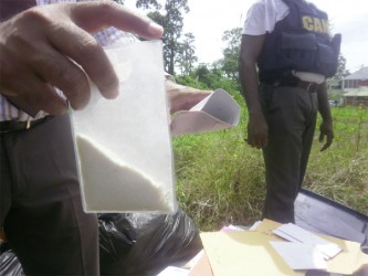 A packet of cocaine which was discovered hidden in a letter. 