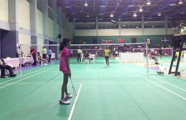 Priyanna Ramdhani competing in her U13 finals match with Jamaican Shezelle McTyson.