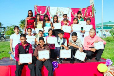  Students who graduated from the Aditya Foundation with their certificates