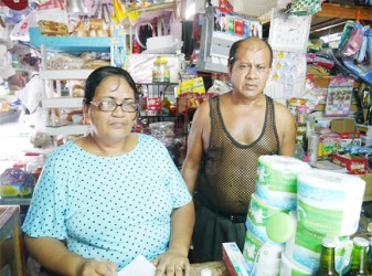 Sham Umrigar and his wife in their shop 