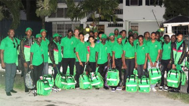 The national team yesterday morning at the Olympic House on High Street before leaving for the South American Youth Games (Orlando Charles photo). 