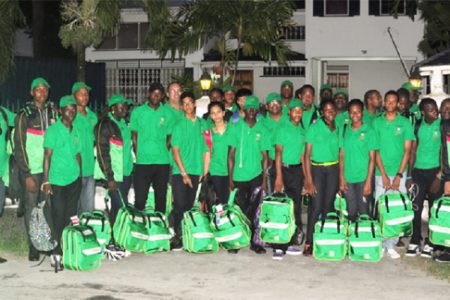 The national team yesterday morning at the Olympic House on High Street before leaving for the South American Youth Games (Orlando Charles photo).
