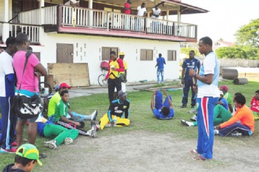 Demerara Inter County One Day captain Christopher Barnwell gives his teammates a pep talk ahead of Saturday’s Inter County match against Essequibo. (Orlando Charles photo) 