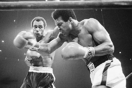 Ken Norton (left) and Muhammad Ali during one of their bouts