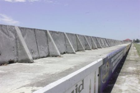 Part of the mobile wave wall on the seawall along the Rupert Craig Highway from Liliendaal to Conversation Tree. (Stabroek News file photo)
