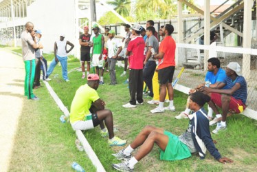 Chairman of the national selectors Rayon Griffith gives the Berbice players a pep talk. (Orlando Charles Photo) 