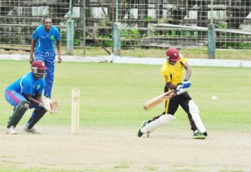 Kemo Paul crunches one during his half-century knock. (Orlando Charles photo)