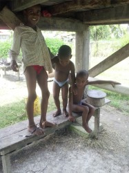  Young lads under a bottom house