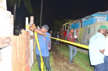 Police last evening cordoning off the crime scene area.  