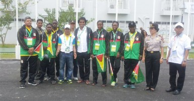 Guyana’s national multi-discipline team in the Games Village after the opening ceremony of the Islamic Sports Solidarity Federation (ISSF) Games in Palembang, Indonesia. (Photo compliments of Winston George). 