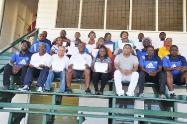 Participants (with certificates) seen with workshop facilitators and GFF Vice-President Ivan Persaud (3rd right sitting) shortly before the seminar’s conclusion on Sunday. 