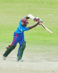 Rajendra Chandrika drives elegantly during his half century knock yesterday. 