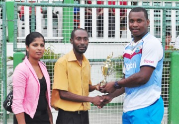 Christopher Barnwell receives his man of the match trophy for the second match in succession. 