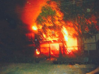The London sisters’ home in flames last night. (Photo by David Papannah)